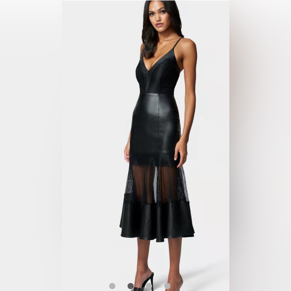 Bebe Vegan leather and mesh sexy dress! Built in bra and adjustable straps!